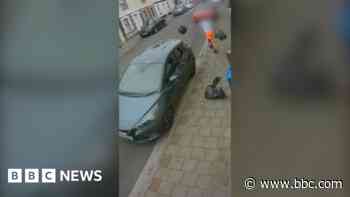 Bin man seen on CCTV dropping rubbish bags