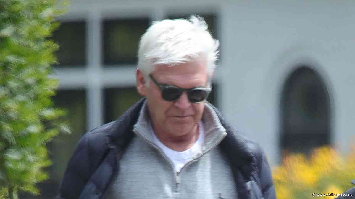 Phillip Schofield takes his dog Alfie for a walk as rumours surrounding his comeback deepen after TV pals showed their support