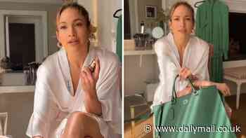 Jennifer Lopez seems chipper in her $60M LA mansion as she tells fans she is packing for a trip to New York City... amid Ben Affleck 'split' drama