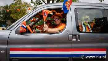 In beeld | Oranjefans in karavaan naar Hamburg voor eerste EK-duel
