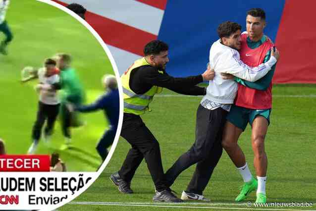 Fans bestormen veld na open training Portugal op zoek naar Ronaldo, doelman grijpt mee in