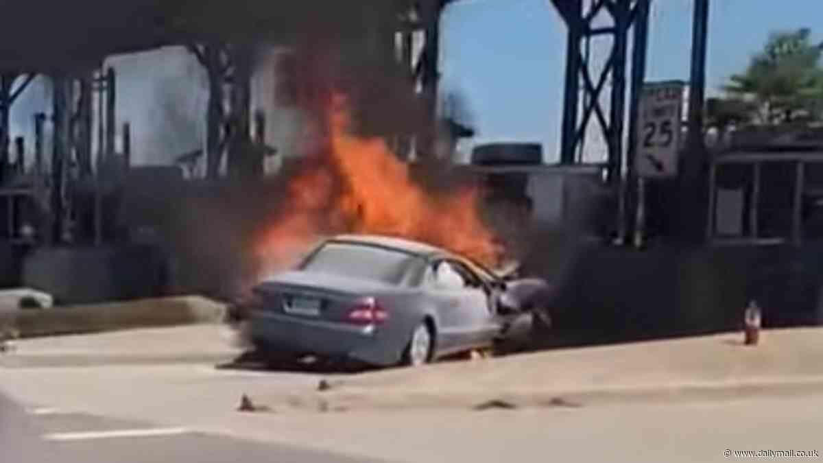 Horrifying footage shows burned out mangled Mercedes after beloved charity worker slammed his car into toll booth before exploding into fireball