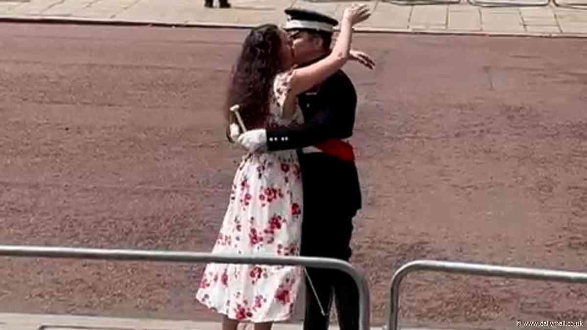 Royally engaged! Adorable moment soldier proposes in front of cheering crowds... before having to dash off to Trooping the Colour parade