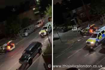 Viral video shows police car crash into cow in Surrey