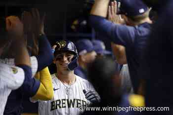 Ortiz and Wilson lead Brewers to 3-1 win over the Reds