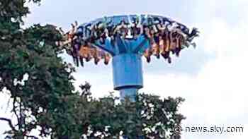 Dozens of people stuck upside down 100ft in the air on amusement park ride