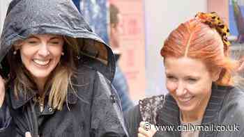 Donna Air and Stacey Dooley leave themselves high-and-no-so dry as pair get drenched during torrential summer downpour after stepping out without an umbrella