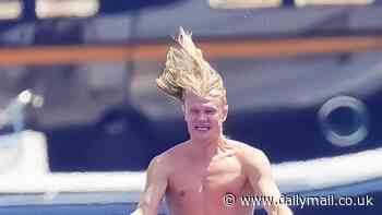 Erling Haaland lets his hair down in St. Tropez as shirtless Manchester City ace soaks up the sun during summer break after Norway failed to qualify for Euro 2024