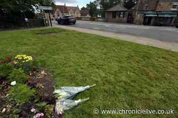 Floral tributes left at the scene in Ponteland where man tragically died after being hit by a car