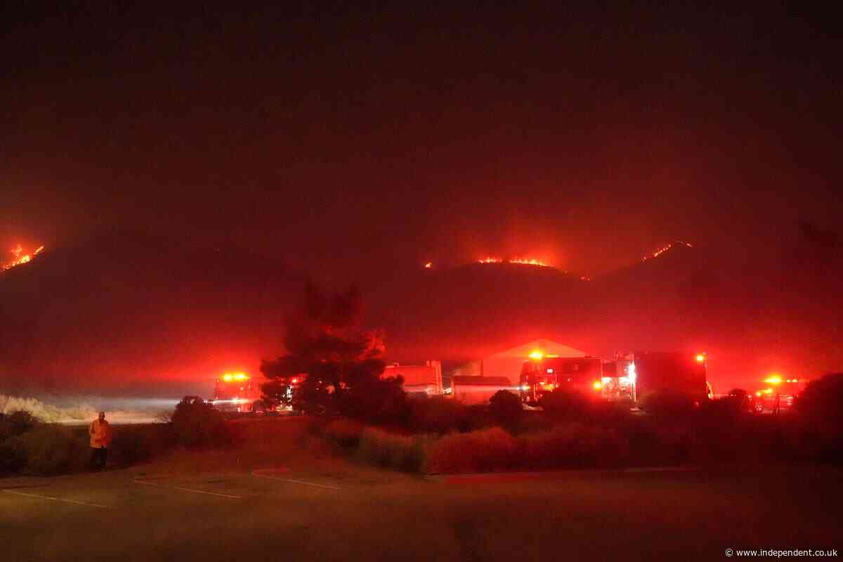 Wildfire erupts burning more than 11,000 acres near Los Angeles, mass evacuation underway