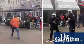 Fans clash before England-Serbia game in Gelsenkirchen – video
