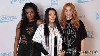Sugababes hit the Capital Summertime Ball! Siobhán Donaghy and Keisha Buchanan pose in edgy black outfits whilst Mutya Buena keeps it racy in thigh high leather boots