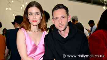 Kate Mara looks glamorous in silk pink dress as she makes rare loved-up appearance with her husband Jamie Bell at JW Anderson show in Milan