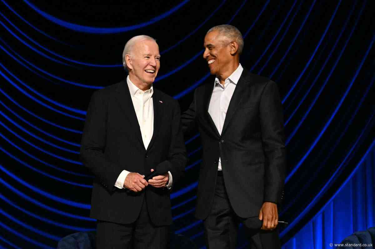 Joe Biden appears to freeze again at fundraiser as Barack Obama helps him off stage