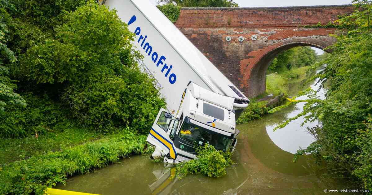 Lorry ends up in canal after early morning crash