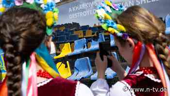 "Wir leben noch": Ukraine mahnt in München mit kriegszerstörter Tribüne