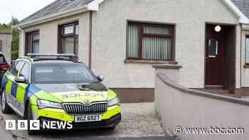 Man arrested after pensioner found dead in bathroom