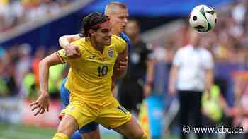 Romania blanks Ukraine for 1st win at Euro Championship in 24 years