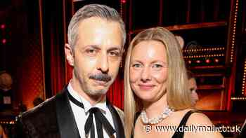 Jeremy Strong, 45, poses with his wife Emma Wall, 36, at the Tony Awards where the Succession star wins Best Actor