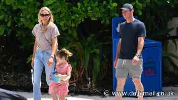 Rory McIlroy puts his wedding ring back on as he and wife Erica Stoll play happy families after shock divorce U-turn and golf star's US Open meltdown on day out with daughter Poppy