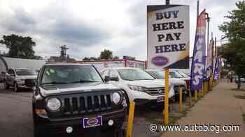 What is a buy here pay here car dealership?