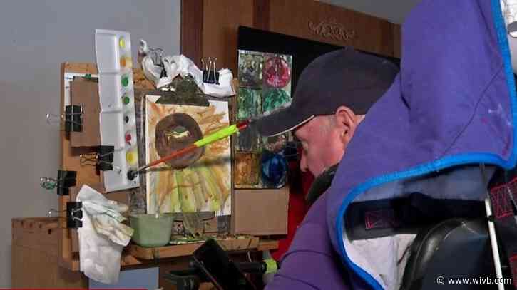 'An answer to my prayers': Local man with MS raises money by painting with brush attached to hat