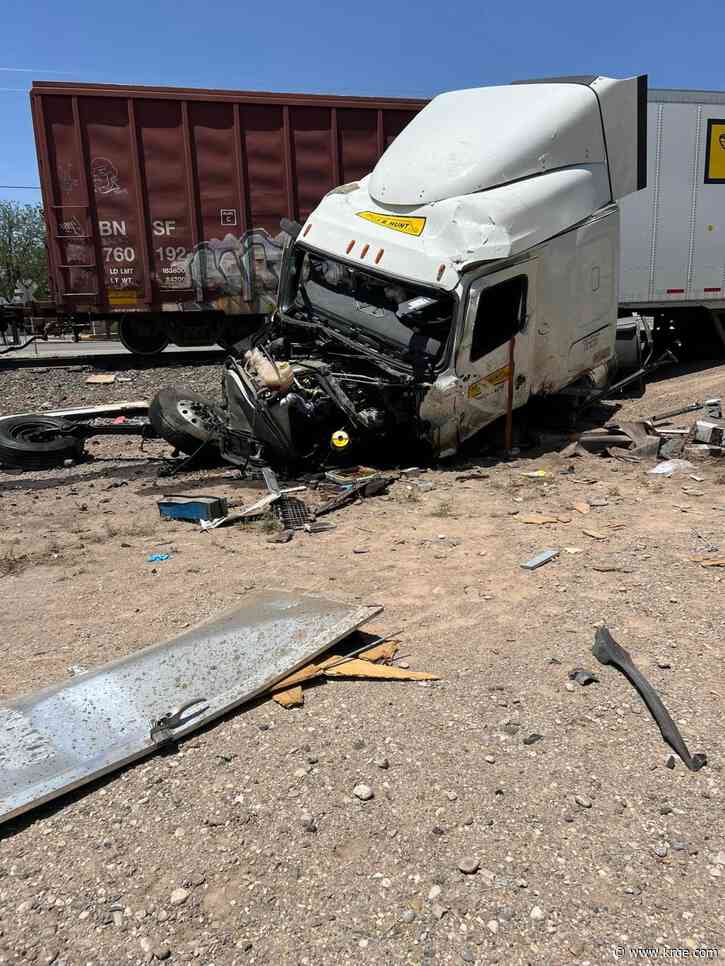 Driver severely injured after train and semi-truck collide in Dexter