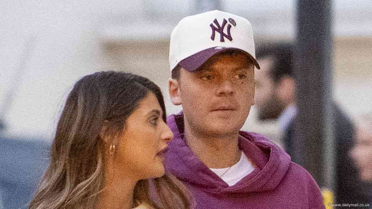 Conor Maynard brushes off paternity  drama as he kisses new girlfriend during boozy pub date - after The Traitors star Charlotte Chilton claimed he was the father of her unborn child