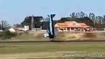 Shocking moment small plane flips over after landing at Brazilian airport