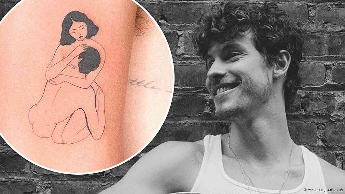 Shawn Mendes' racy new tattoo of a naked man cuddling a woman causes a stir among his fans: 'Who's that lucky lady though?'