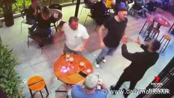 Wild moment footy star brawls with pub security guard after being cut off from alcohol