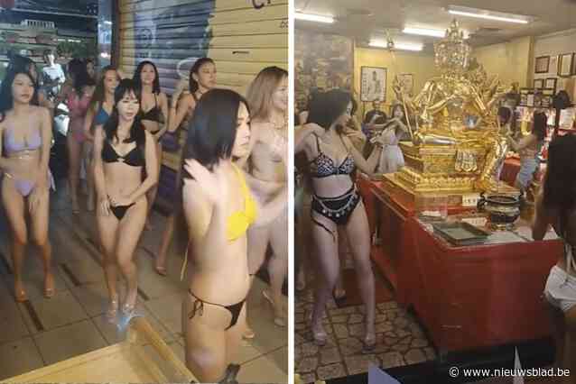 50 strippers dansen tussen heiligenbeelden om gebeden van gelovige kracht bij te zetten