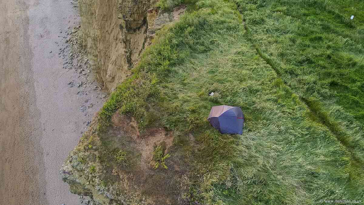The height of stupidity! Wild camper who set up tent inches from edge of 150ft crumbling Broadchurch cliffs is slammed by locals