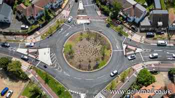 Fury over chaotic European-style 'Cyclops' roundabout with 31 sets of traffic lights - so can YOU work out where you're supposed to go?