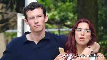 Dua Lipa and her boyfriend Callum Turner put on a loved-up display as they enjoy an ice cream date in sunny New York City