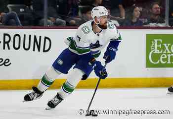 Vancouver Canucks sign defenceman Hronek to eight-year extension