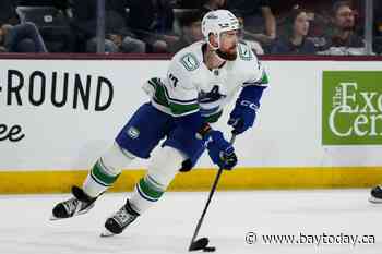 Vancouver Canucks sign defenceman Hronek to eight-year extension