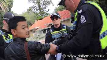 Police threaten lone protester in Perth trying to fly a Free Hong Kong flag next to CCP Premier Li Qiang's motorcade
