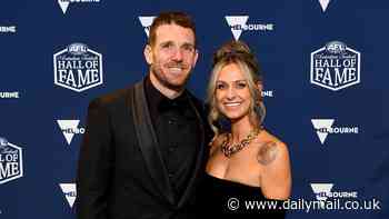 Footy legend Dane Swan's girlfriend gives him a frosty look as he makes a cheeky remark about her in hilarious Hall of Fame speech