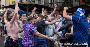 Scotland fans won't let terrible weather ruin Euros party as they dance in the rain