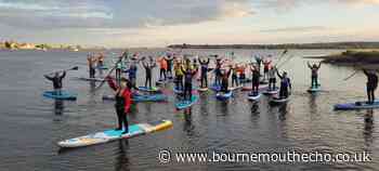 Full moon paddleboard event at Mudeford for Summer Solstice