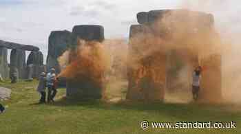 Two Just Stop Oil protesters arrested after spraying Stonehenge orange