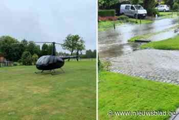 Helikopter maakte noodlanding in tuin van schepen tijdens wolkbreuk: “Ze waren in een waterval terecht gekomen”