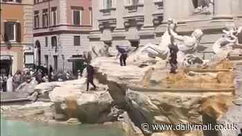 Moment Brits cheer as tourist tries to scale marble horse in Rome's famed Trevi fountain before being tackled by bystanders and Italian cops