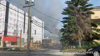 Calgary fire crews at 2-alarm fire in Bowness