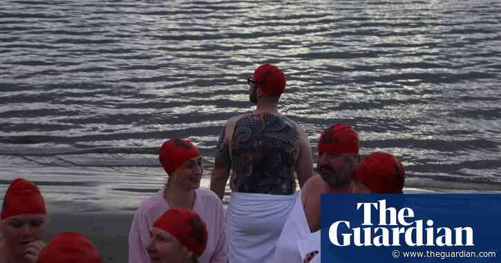 Nude swimmers brave cold for Hobart’s Dark Mofo dip – in pictures