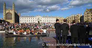 Thousands watch King's College choir from banks of the River Cam