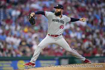 Brewers acquire left-hander Dallas Keuchel from Mariners for cash