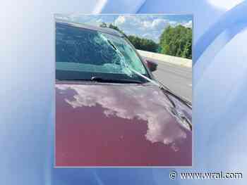 Caught on cam: Crowbar flies into WRAL employee's windshield on I-40