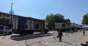 Ironman setting up in Bolton town centre ahead of weekend